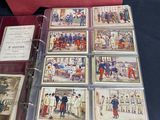 a lot of cards in a red box on a table