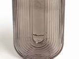 un vase en verre mesurant 34 cm de haut