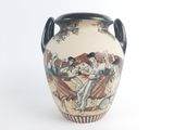 a vase with a painting on it on a white background