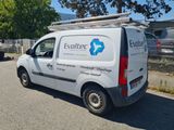 a van that is parked on the side of the road