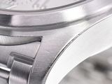 a close up view of a watch with a metal band