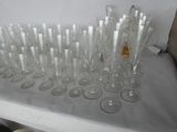 a lot of empty wine glasses sitting on a table
