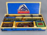 a box with a train set in it on a table