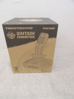 a box with a game controller in it on a table