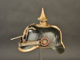 a helmet on a stand on a gray background
