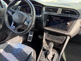 the interior of a car with a steering wheel, dashboard, and dashboard controls