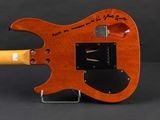 a guitar that has a clock on it
