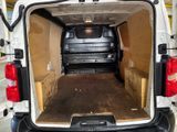 a white van that is parked in a garage