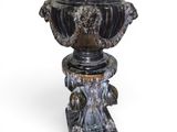 a vase that is sitting on a pedestal on a white background