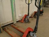 two pallets sitting next to each other in a warehouse