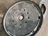 an overhead view of a shower head on the ground