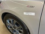 a close up of a car with a sticker on the side of it