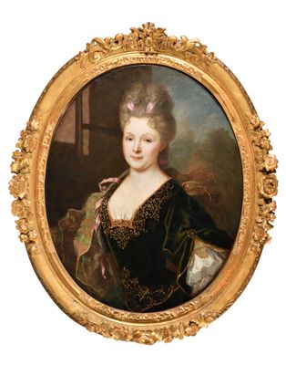 portrait of a lady in a green dress with a gold frame