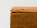 an image of a close up of a piece of cardboard on a table