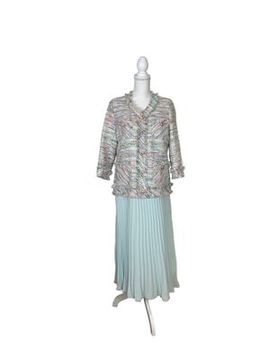 an image of a dress and jacket on a mannequin