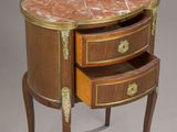 an image of a small table with two drawers and a marble top