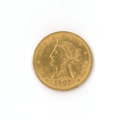 une image d'une pièce d'or sur une surface blanche