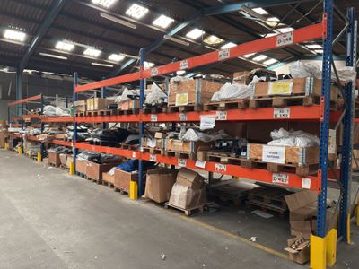 a large warehouse filled with lots of boxes and boxes