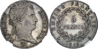 a close up of a coin with a woman ' s face on it
