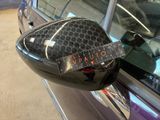 a sticker on the side view mirror of a car