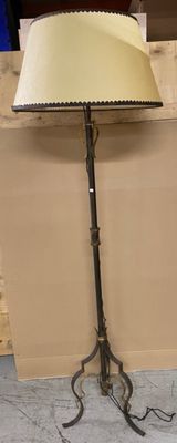 an image of a lamp that is on a stand in a room