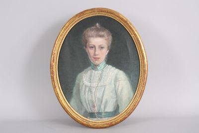 portrait of a woman in a white dress in a gold frame