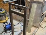 an image of a metal frame being built in a workshop