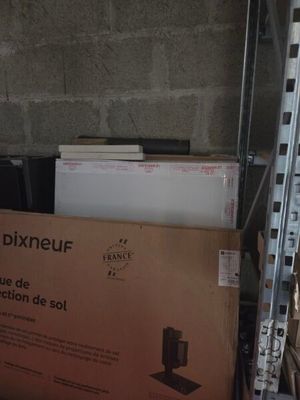 a box of electronic equipment sitting on a shelf in a room