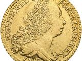 l'image d'une pièce d'or sur laquelle figure une tête de femme