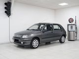 a picture of a car parked in a garage