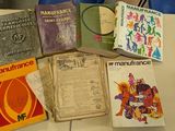 many books that are sitting on a table