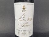 a bottle of wine that is sitting on a table