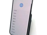 an iphone with a screen showing the location of the world on it