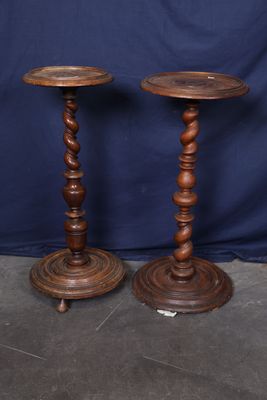 pair of antique wooden candlesticks with turned bases