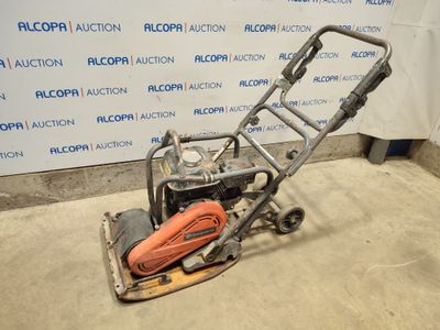 an image of a small machine that is sitting on the floor