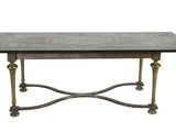 une image représentant une table avec un plateau en marbre et des pieds en métal