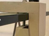 an image of a close up of a table with a piece of metal
