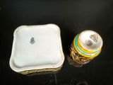 a picture of a table with a plate and a container