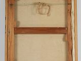 an old picture of a wooden frame with a rope hanging from it ' s side