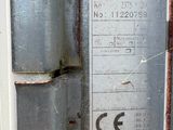 a sign on the side of a metal door