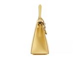 a gold purse on a white background