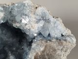 a large piece of rock with a lot of crystals on top of it