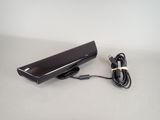 a black power supply that is plugged into a charger