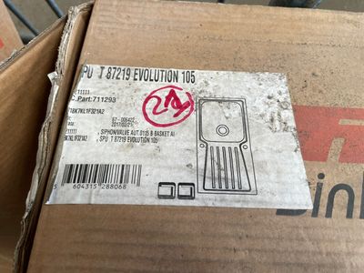a cardboard box with a sticker on it sitting on a table