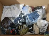 a box full of clothes and other items in it