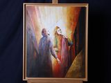 une peinture à l'huile représentant Jésus et Marie posée sur un chevalet