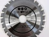 a close up of a circular saw blade on a white surface