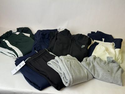 a pile of men ' s clothing on a white table