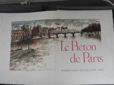 a picture of a book with a picture of paris on it