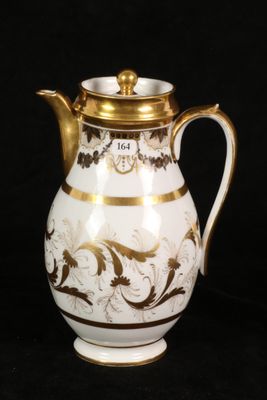 an image of a white and gold coffee pot